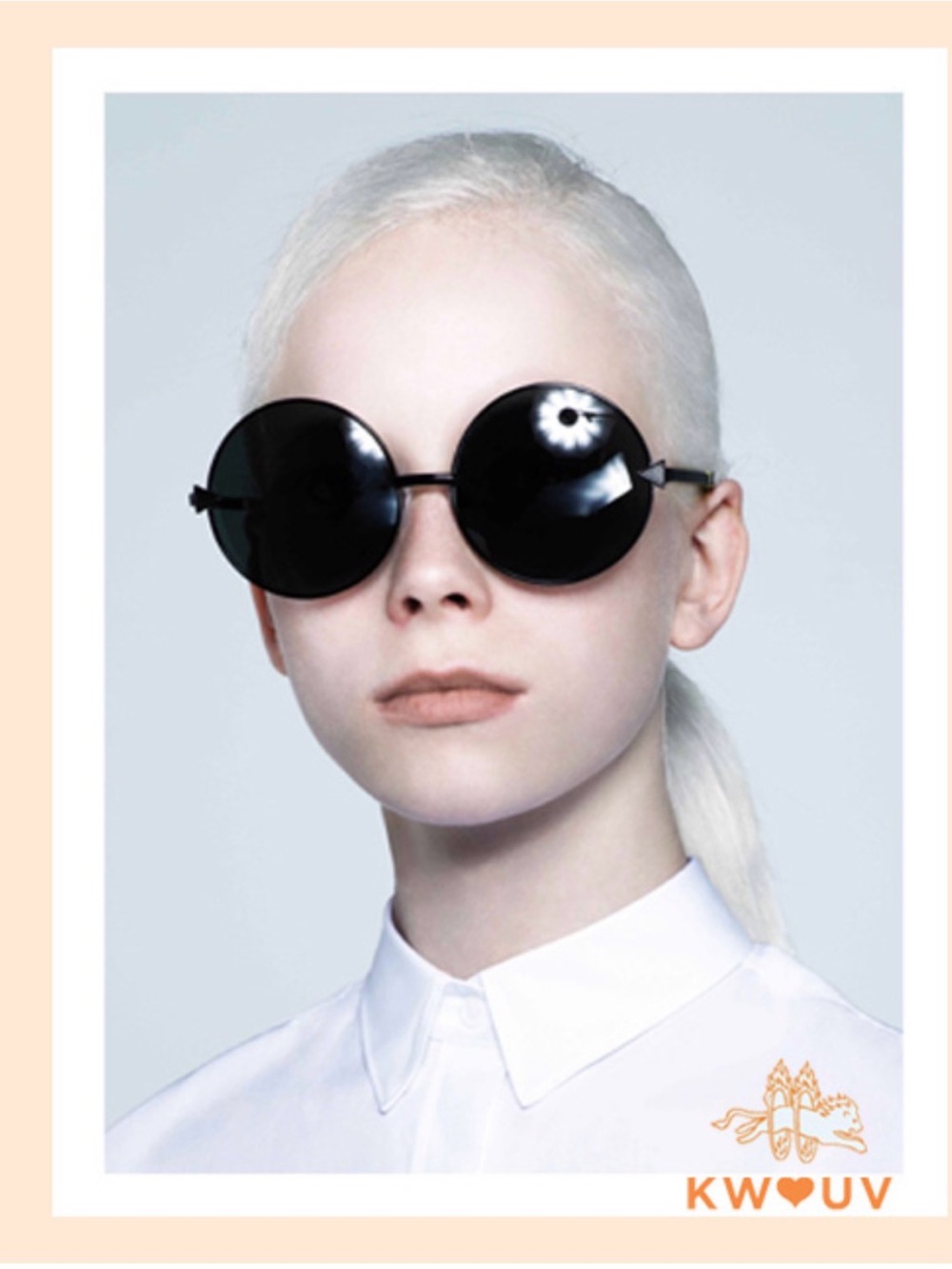 Karen Walker Round Black Sunglasses with Yellow Accents